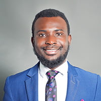 Professional portrait of Joshua Awua